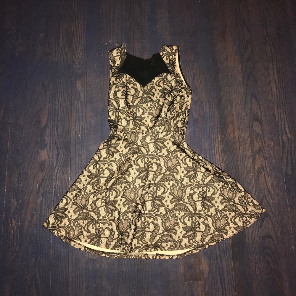 Short beige/black dress.